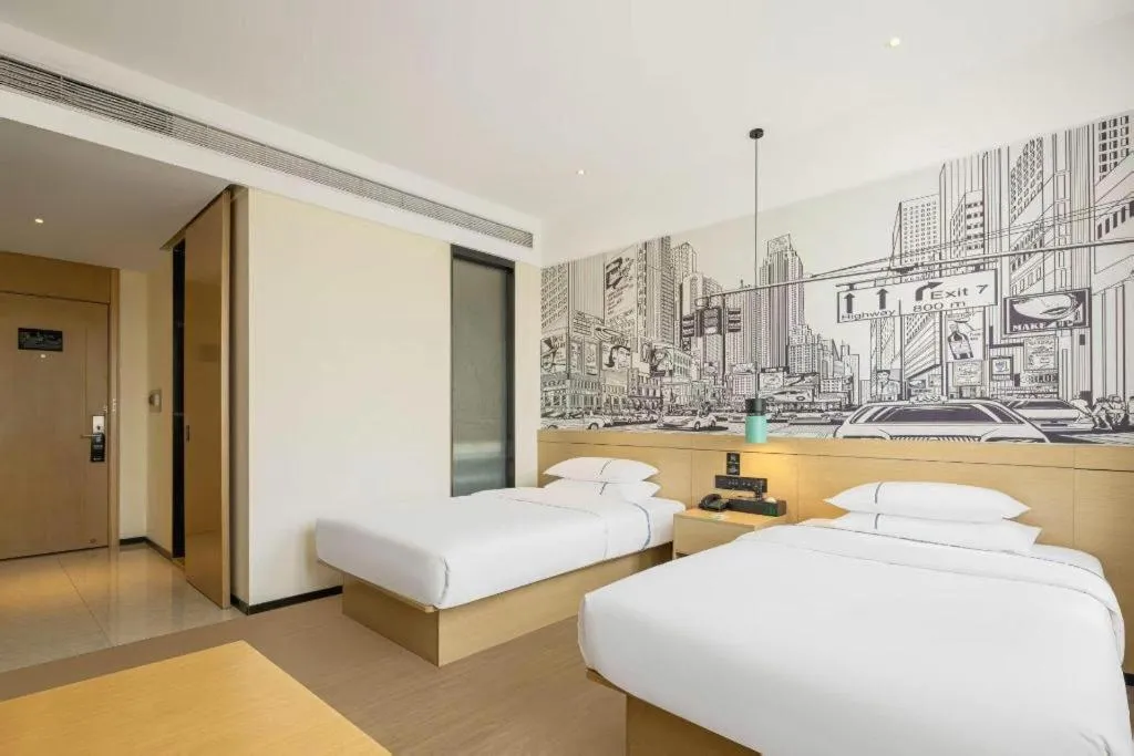 Bed in City Comfort Inn Foshan Shishan Square