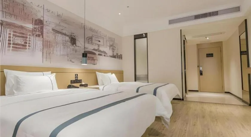 Bed in City Comfort Inn Foshan Shishan Square