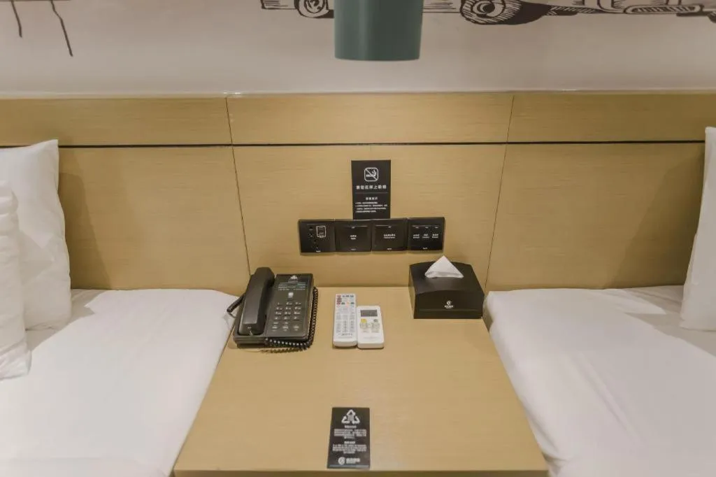 Bed in City Comfort Inn Foshan Shishan Square