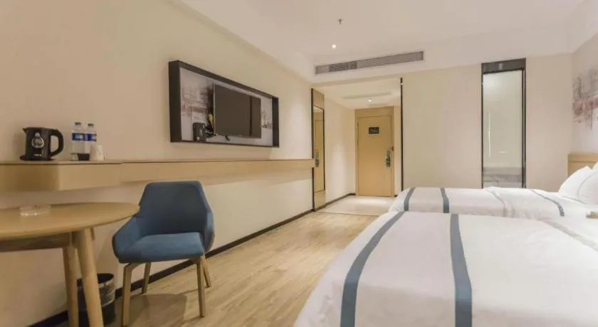 Bed in City Comfort Inn Foshan Shishan Square