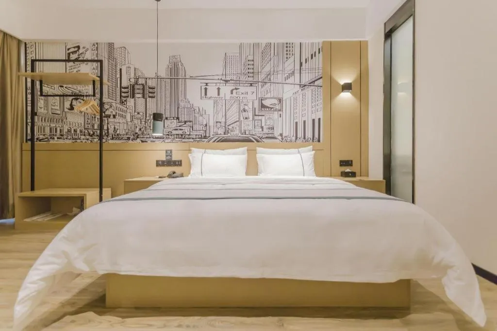 Bed in City Comfort Inn Foshan Shishan Square