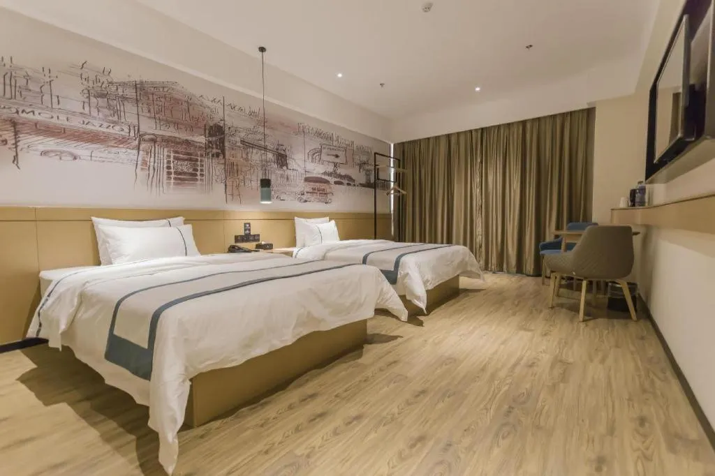 Bed in City Comfort Inn Foshan Shishan Square