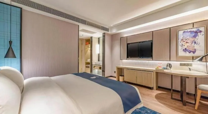 Bed in Echarm Hotel Tai'an Taishan Tianwai Village Hongmen