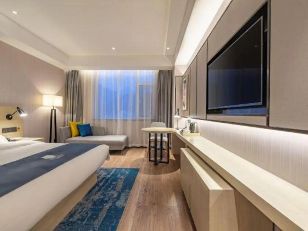 Bed in Echarm Hotel Tai'an Taishan Tianwai Village Hongmen