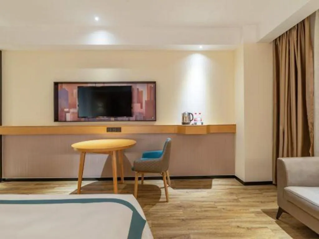 Bed in Echarm Hotel Tai'an Taishan Tianwai Village Hongmen