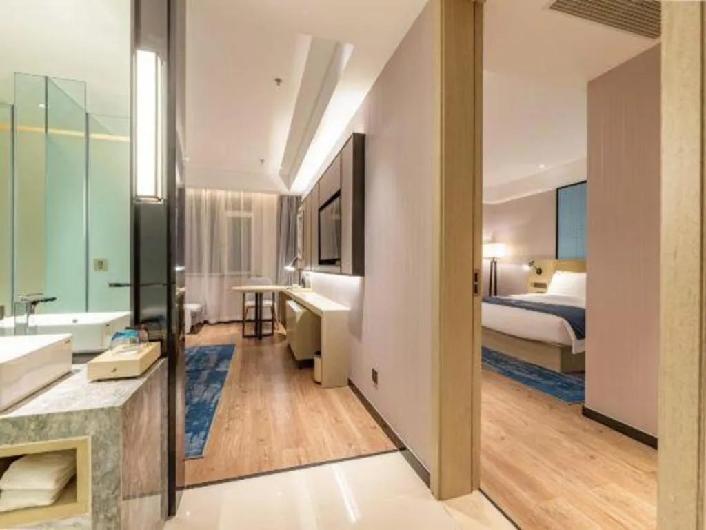 Bed in Echarm Hotel Tai'an Taishan Tianwai Village Hongmen