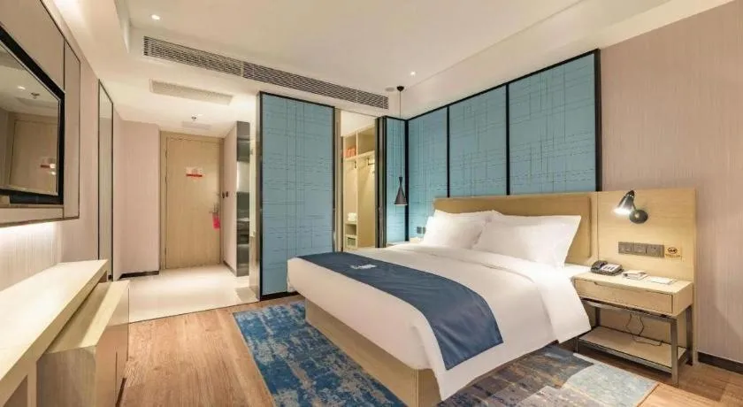 Bed in Echarm Hotel Tai'an Taishan Tianwai Village Hongmen