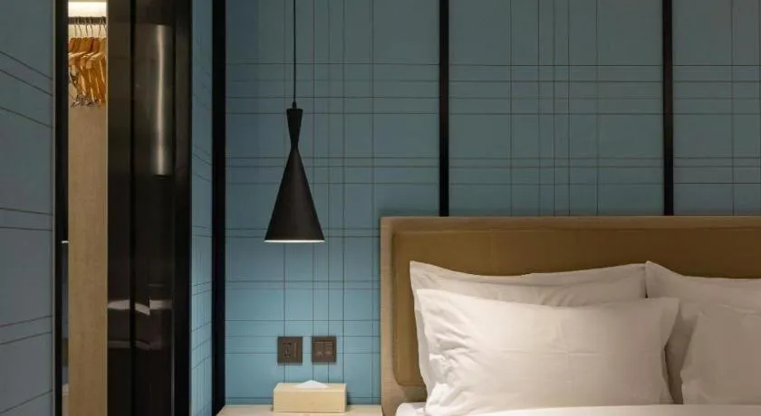 Bed in Echarm Hotel Tai'an Taishan Tianwai Village Hongmen