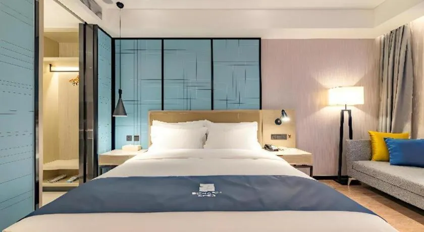 Bed in Echarm Hotel Tai'an Taishan Tianwai Village Hongmen