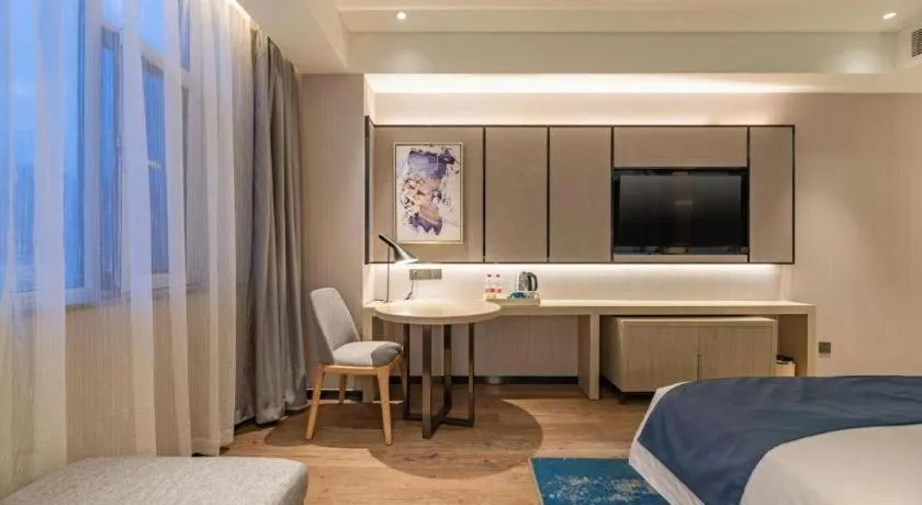 Bed in Echarm Hotel Tai'an Taishan Tianwai Village Hongmen