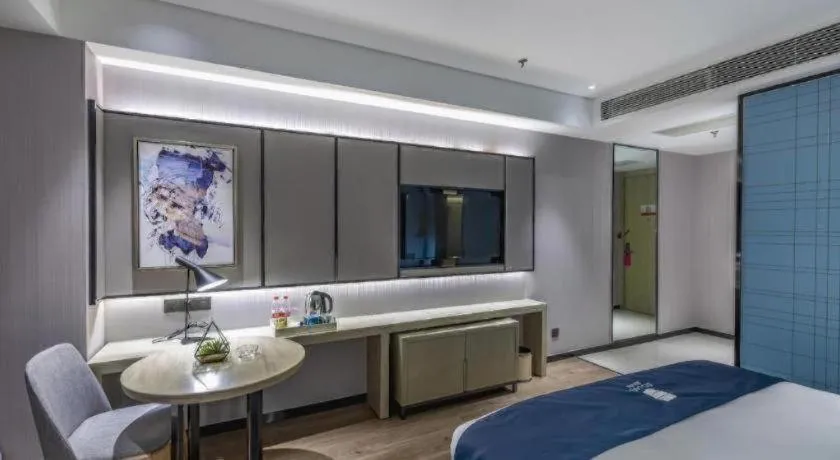 Bed in Echarm Hotel Tai'an Taishan Tianwai Village Hongmen