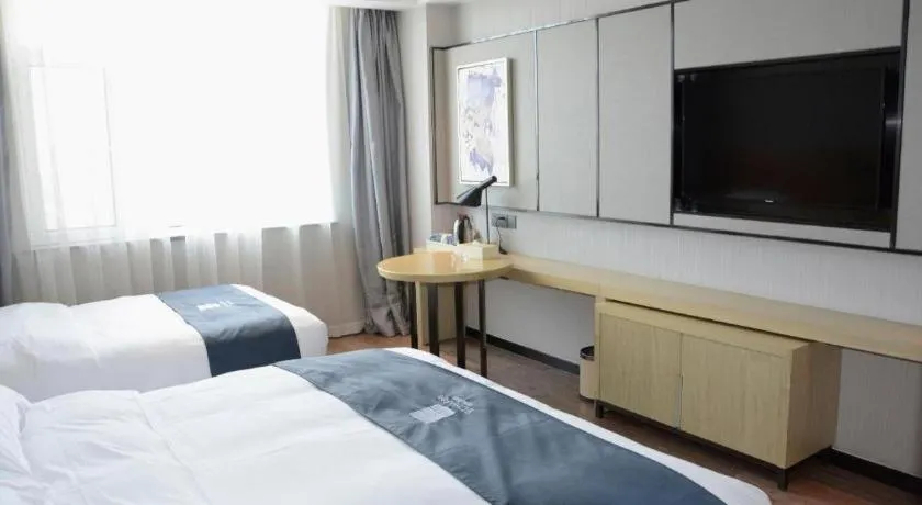 Bed in Echarm Hotel Tai'an Taishan Tianwai Village Hongmen