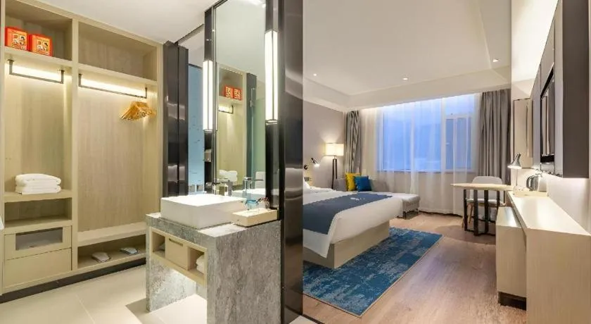 Bed in Echarm Hotel Tai'an Taishan Tianwai Village Hongmen