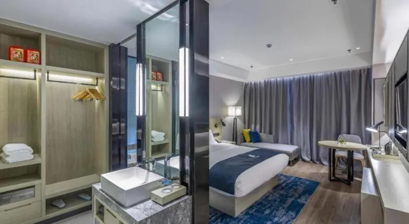 Bed in Echarm Hotel Tai'an Taishan Tianwai Village Hongmen