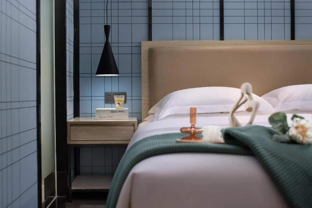 Bed in Echarm Hotel Tai'an Taishan Tianwai Village Hongmen