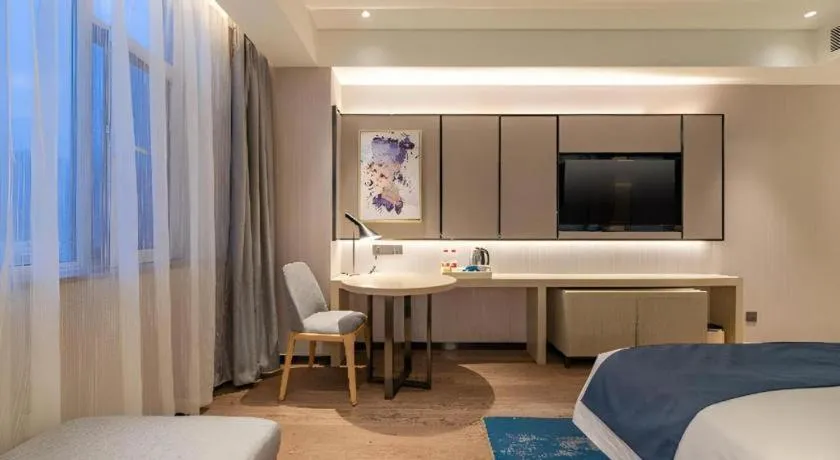 Bed in Echarm Hotel Tai'an Taishan Tianwai Village Hongmen