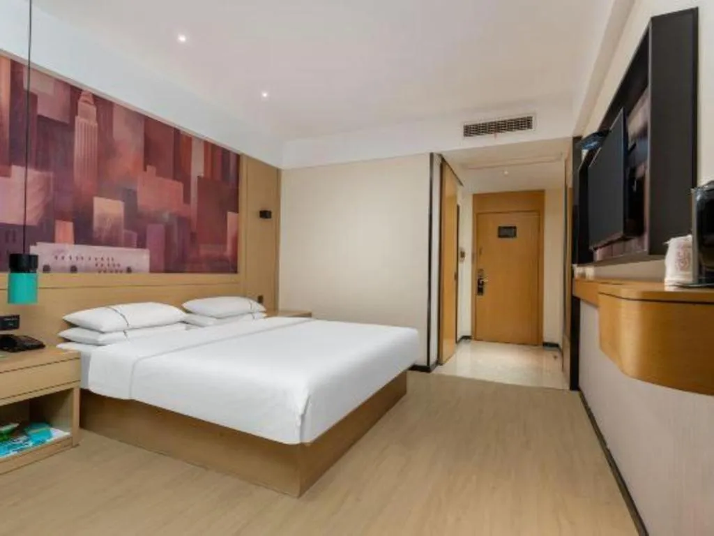 Bed in City Comfort Inn Shiyan Wudang Mountain