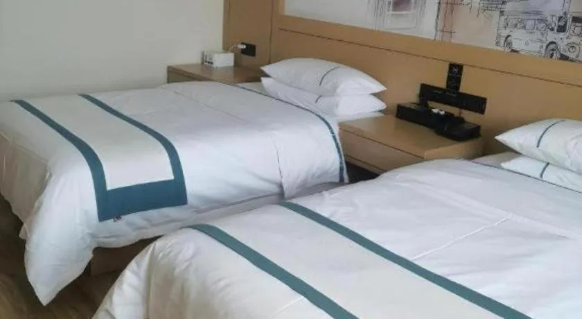 Bed in City Comfort Inn Shiyan Wudang Mountain