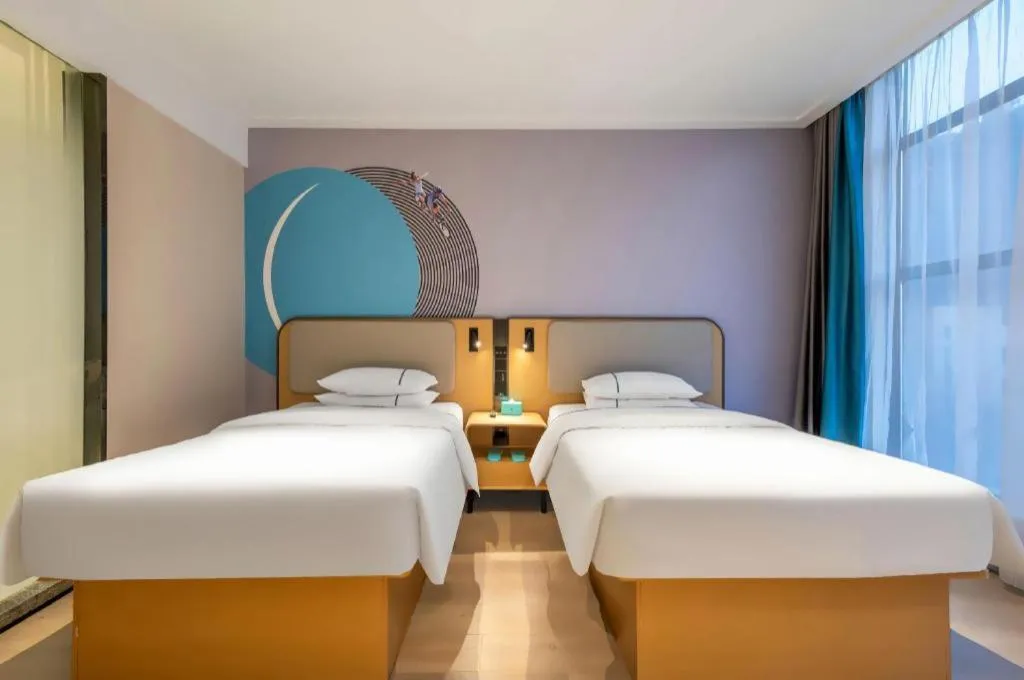 Bed in City Comfort Inn Shiyan Wudang Mountain