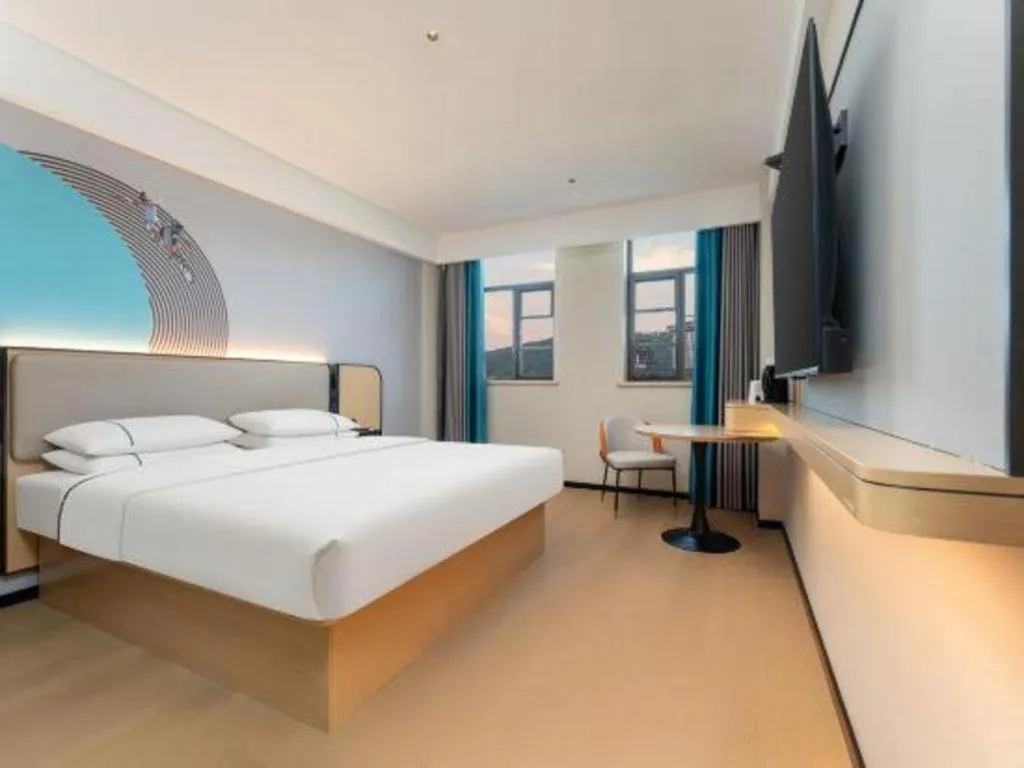 Bed in City Comfort Inn Shiyan Wudang Mountain