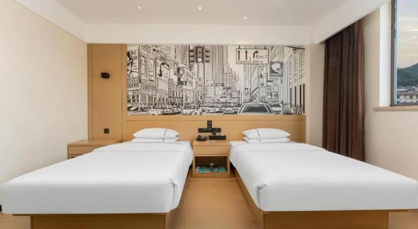 Bed in City Comfort Inn Shiyan Wudang Mountain