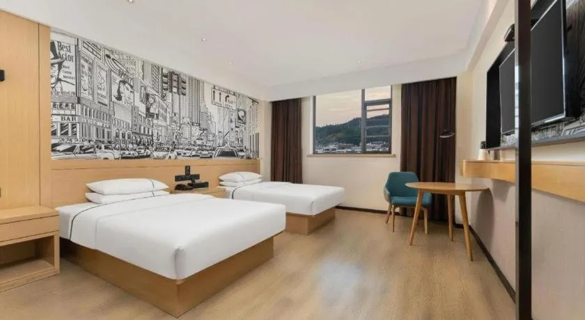 Bed in City Comfort Inn Shiyan Wudang Mountain