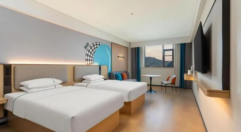 Bed in City Comfort Inn Shiyan Wudang Mountain