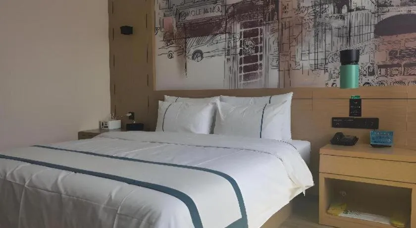 Bed in City Comfort Inn Shiyan Wudang Mountain