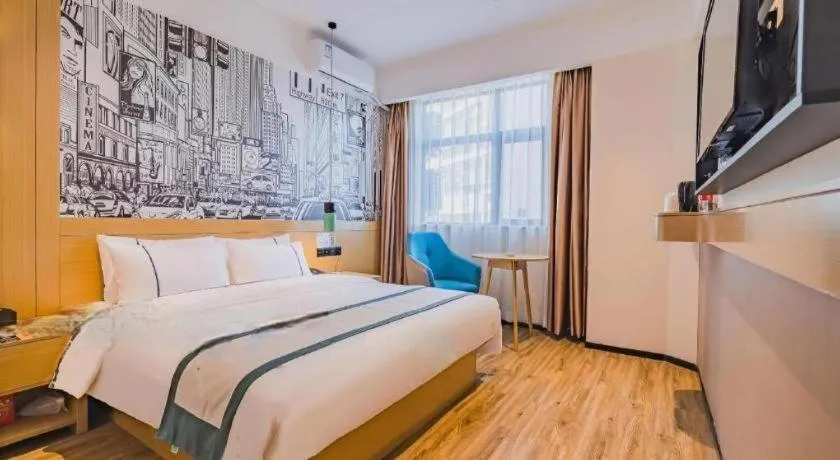 Bed in City Comfort Inn Shiyan Wudang Mountain