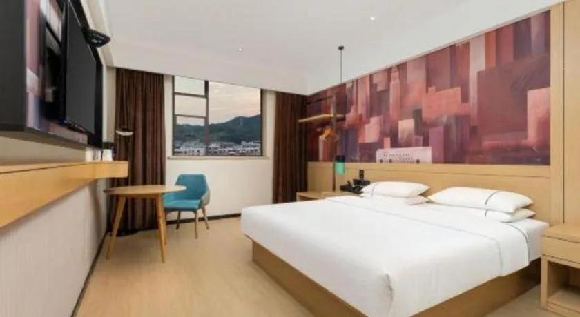 Bed in City Comfort Inn Shiyan Wudang Mountain