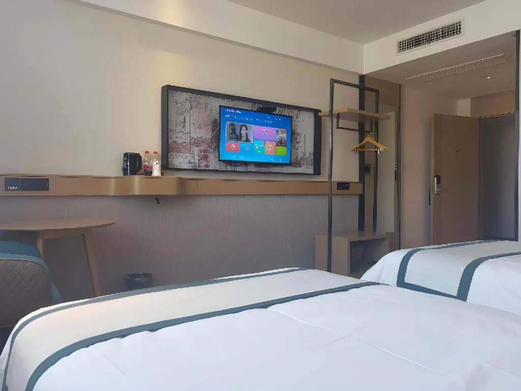 Bed in City Comfort Inn Shiyan Wudang Mountain