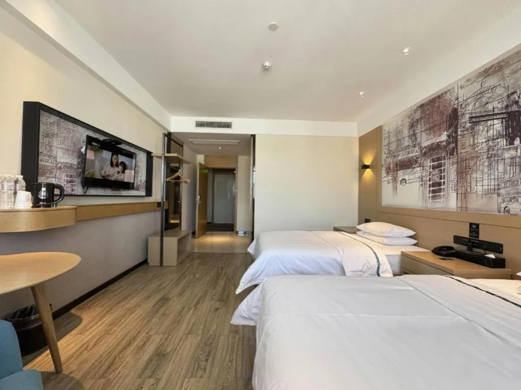 Bed in City Comfort Inn Shiyan Wudang Mountain