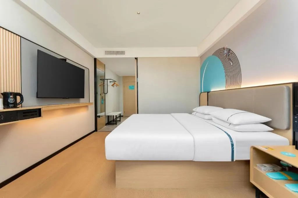 Bed in City Comfort Inn Shiyan Wudang Mountain