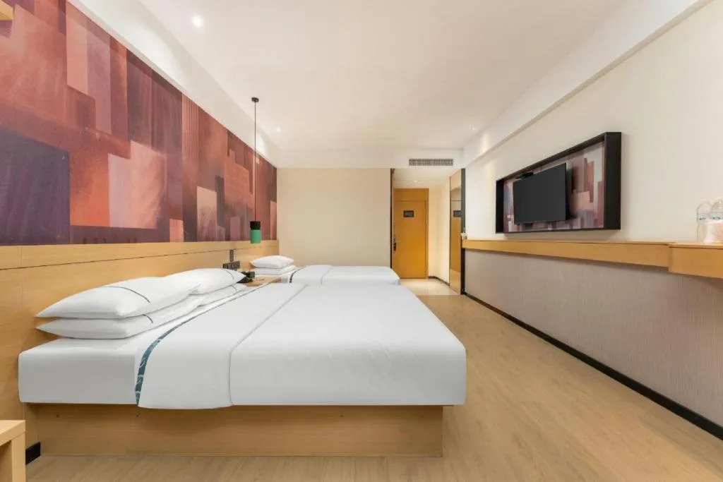 Bed in City Comfort Inn Shiyan Wudang Mountain