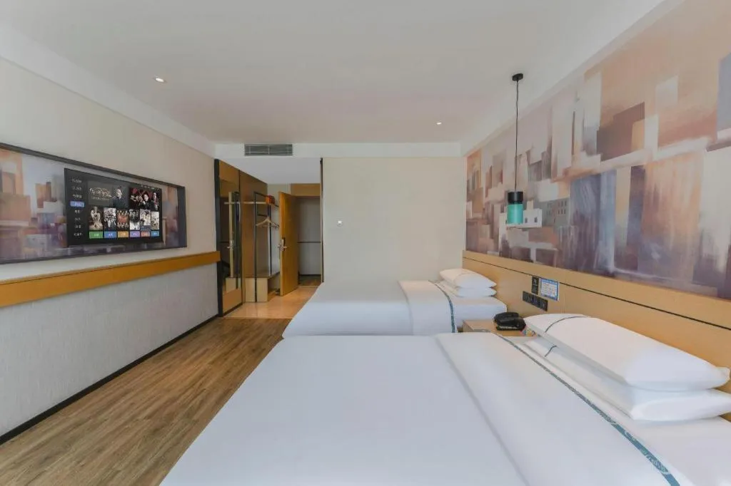 Bed in City Comfort Inn Fuchuan Fenghuang Road