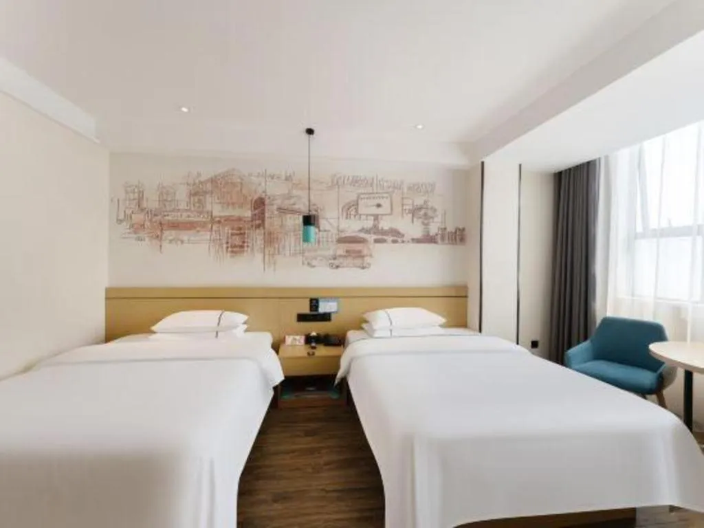 Bed in City Comfort Inn Fuchuan Fenghuang Road