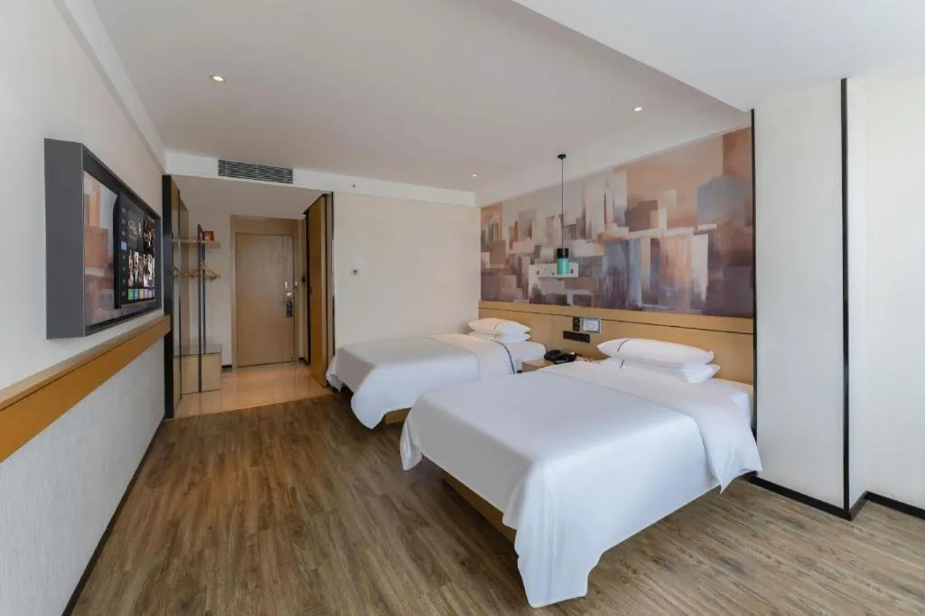 Bed in City Comfort Inn Fuchuan Fenghuang Road