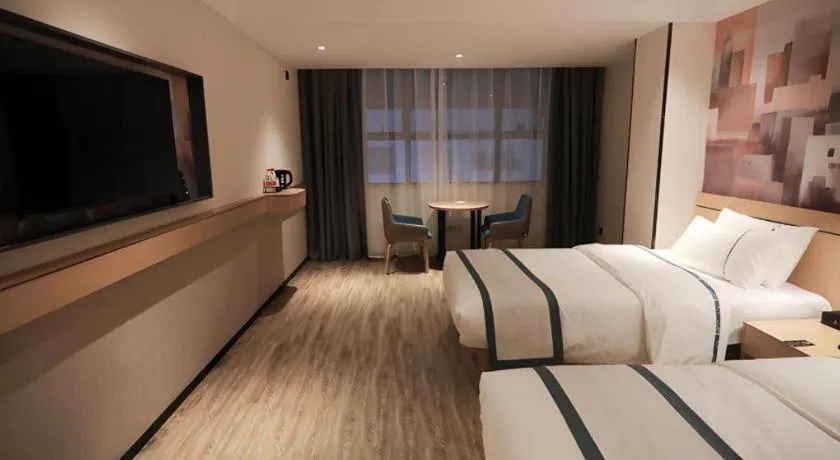 Bed in City Comfort Inn Fuchuan Fenghuang Road