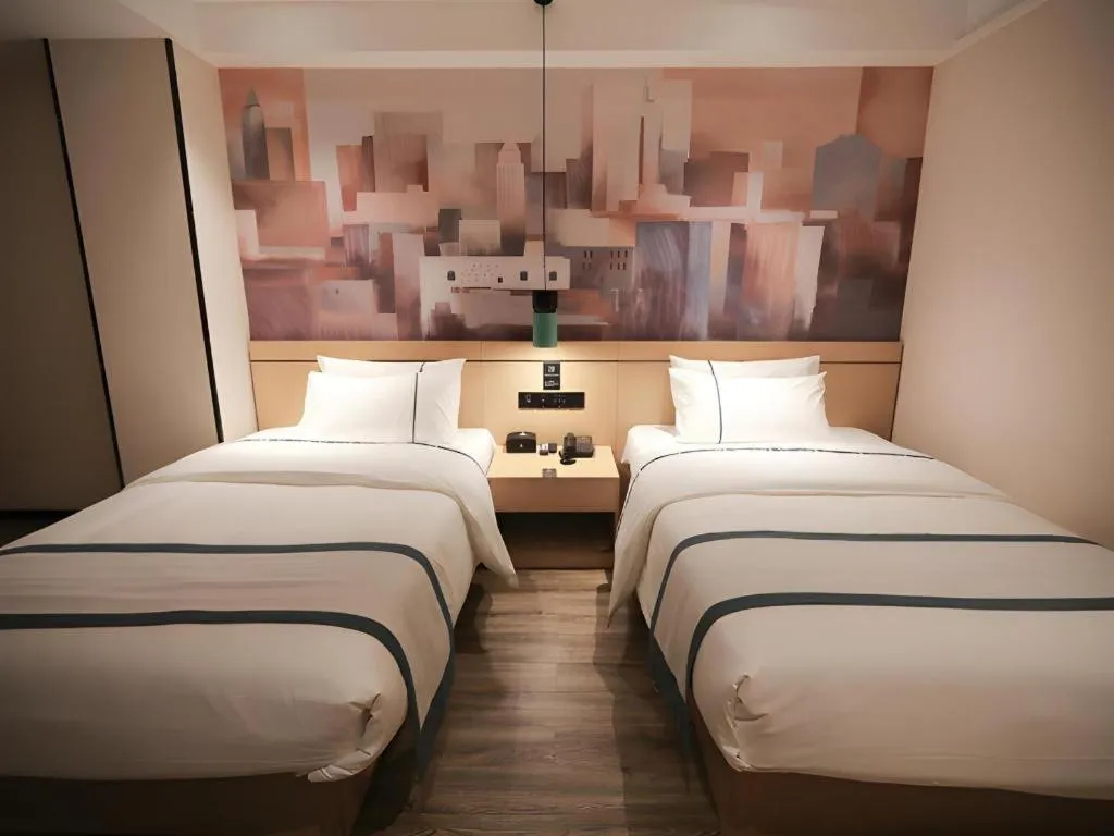 Bed in City Comfort Inn Fuchuan Fenghuang Road