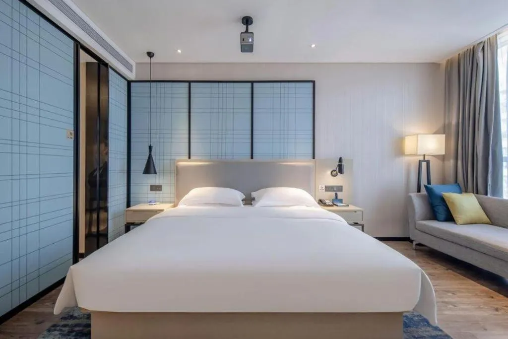 Bed in Echarm Hotel Nanning Dongge Macun Metro Station