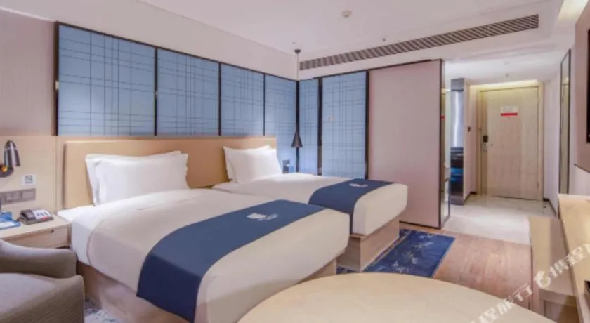 Bed in Echarm Hotel Nanning Dongge Macun Metro Station