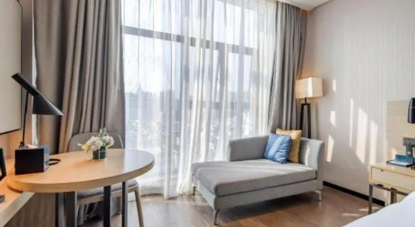 Bed in Echarm Hotel Nanning Dongge Macun Metro Station