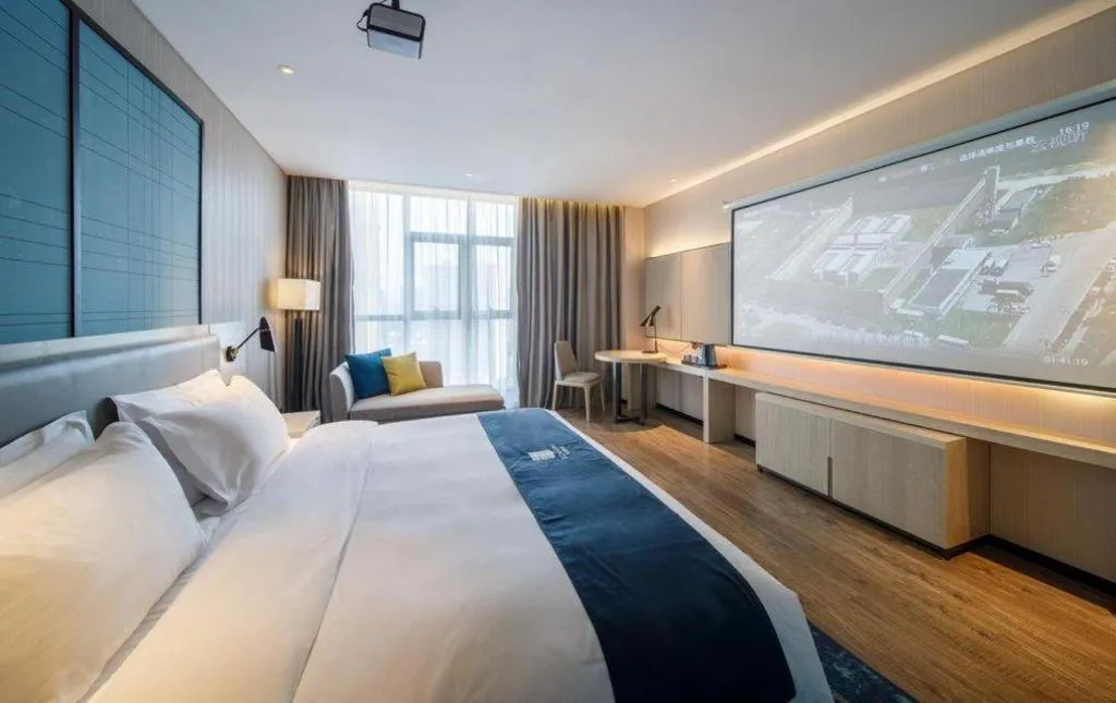 Bed in Echarm Hotel Nanning Dongge Macun Metro Station