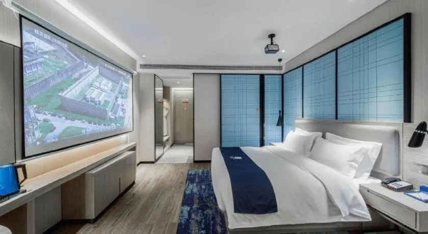 Bed in Echarm Hotel Nanning Dongge Macun Metro Station