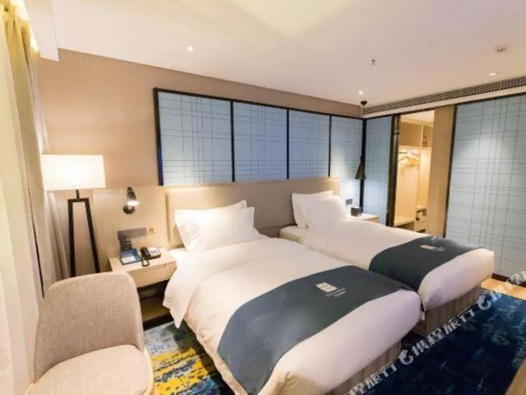 Bed in Echarm Hotel Nanning Dongge Macun Metro Station