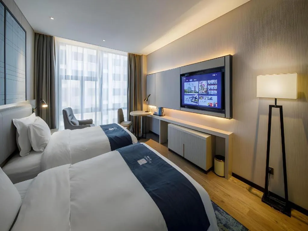 Bed in Echarm Hotel Nanning Dongge Macun Metro Station