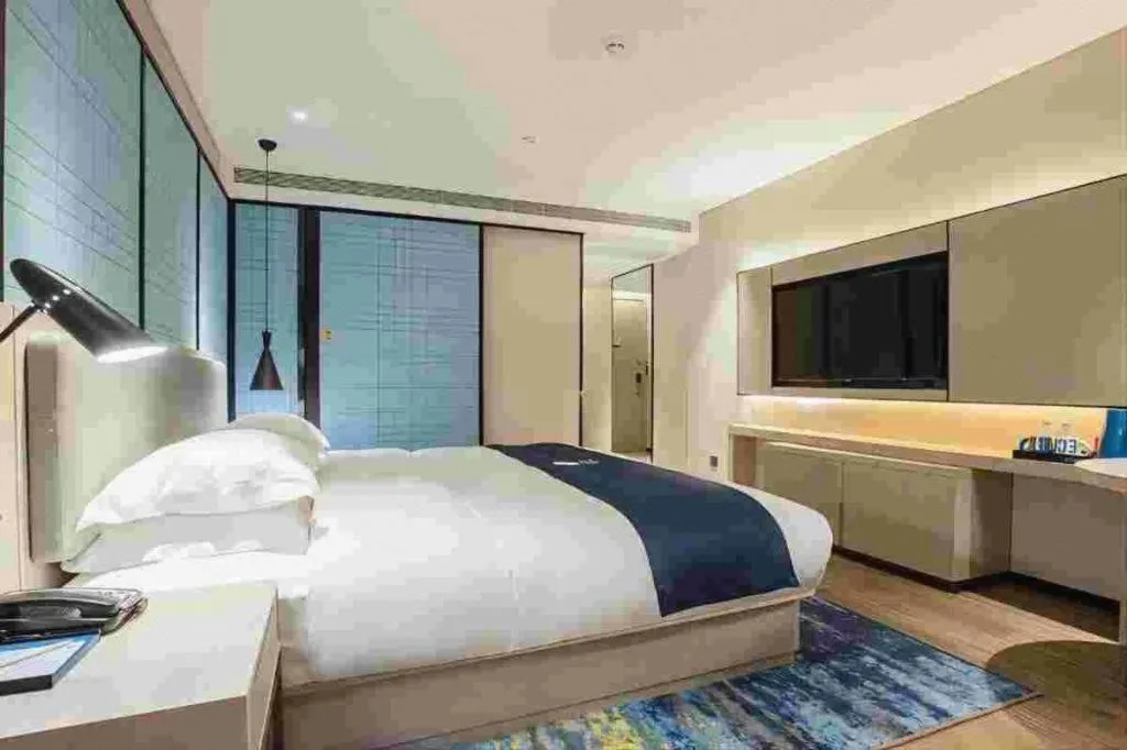 Bed in Echarm Hotel Nanning Dongge Macun Metro Station