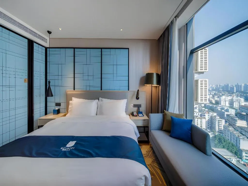 Bed in Echarm Hotel Nanning Dongge Macun Metro Station