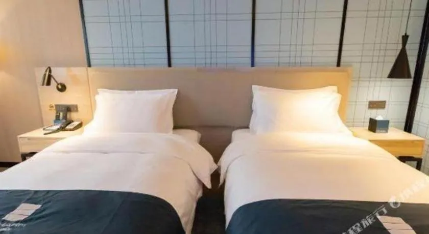 Bed in Echarm Hotel Nanning Dongge Macun Metro Station