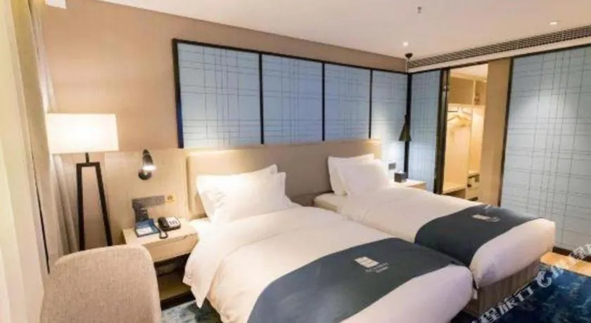 Bed in Echarm Hotel Nanning Dongge Macun Metro Station